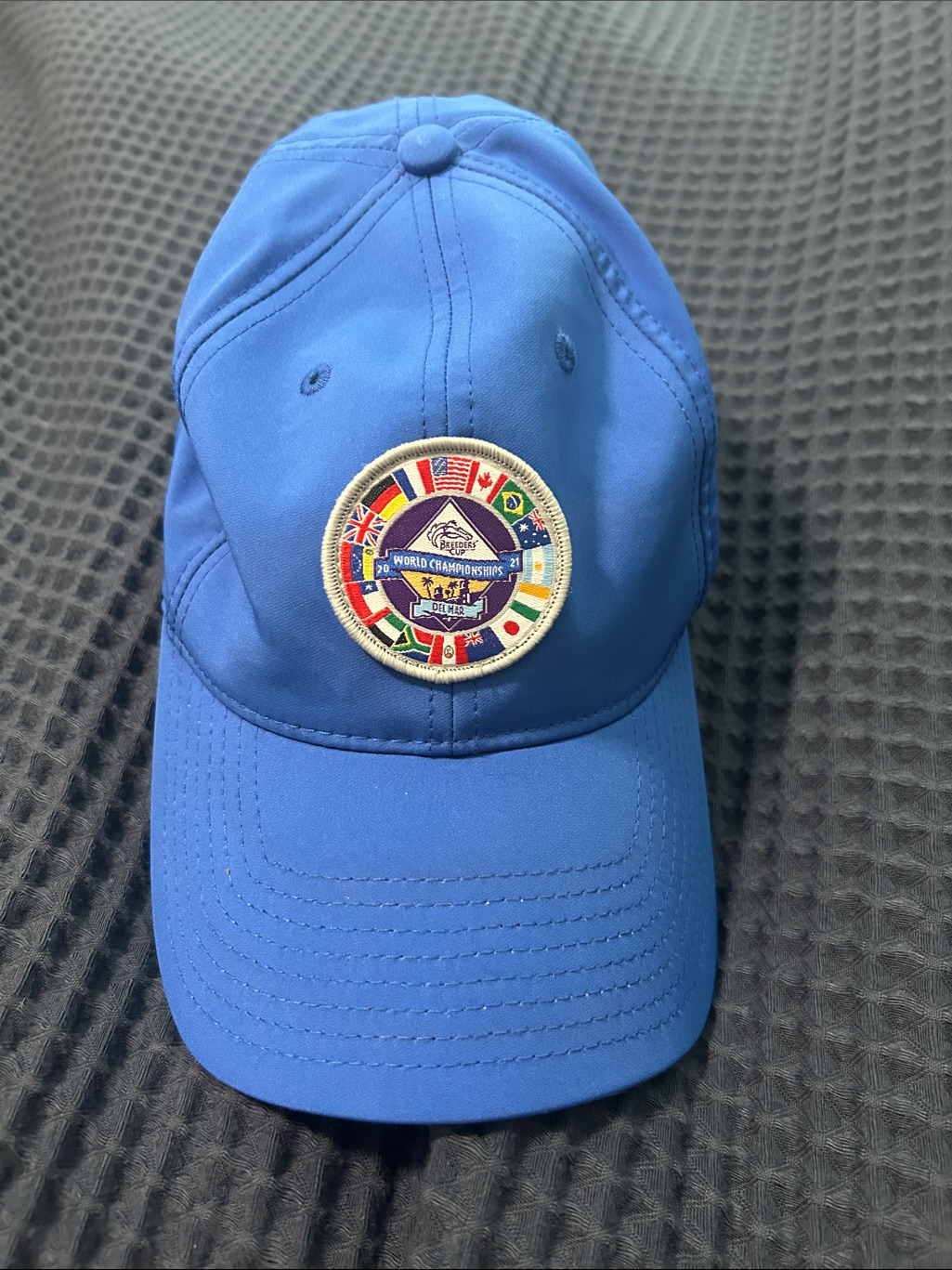 Blue Baseball Cap With MultiFlag Championship Patch